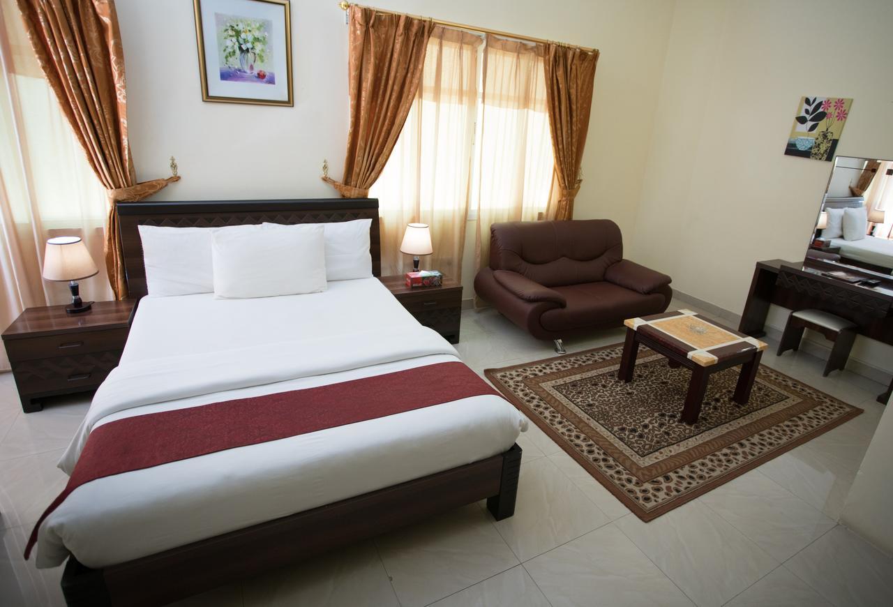 Tiger Home Hotel Apartments Muscat Exterior photo