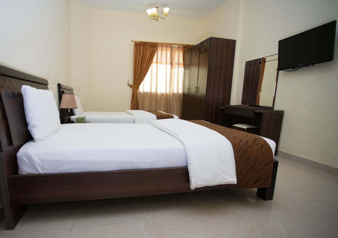Tiger Home Hotel Apartments Muscat Exterior photo